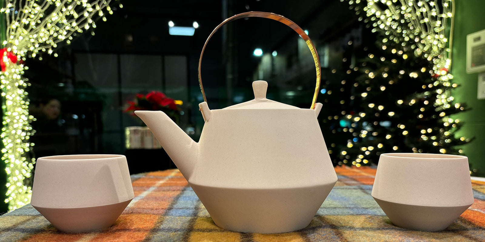 A photograph of a Japanese teapot and cups