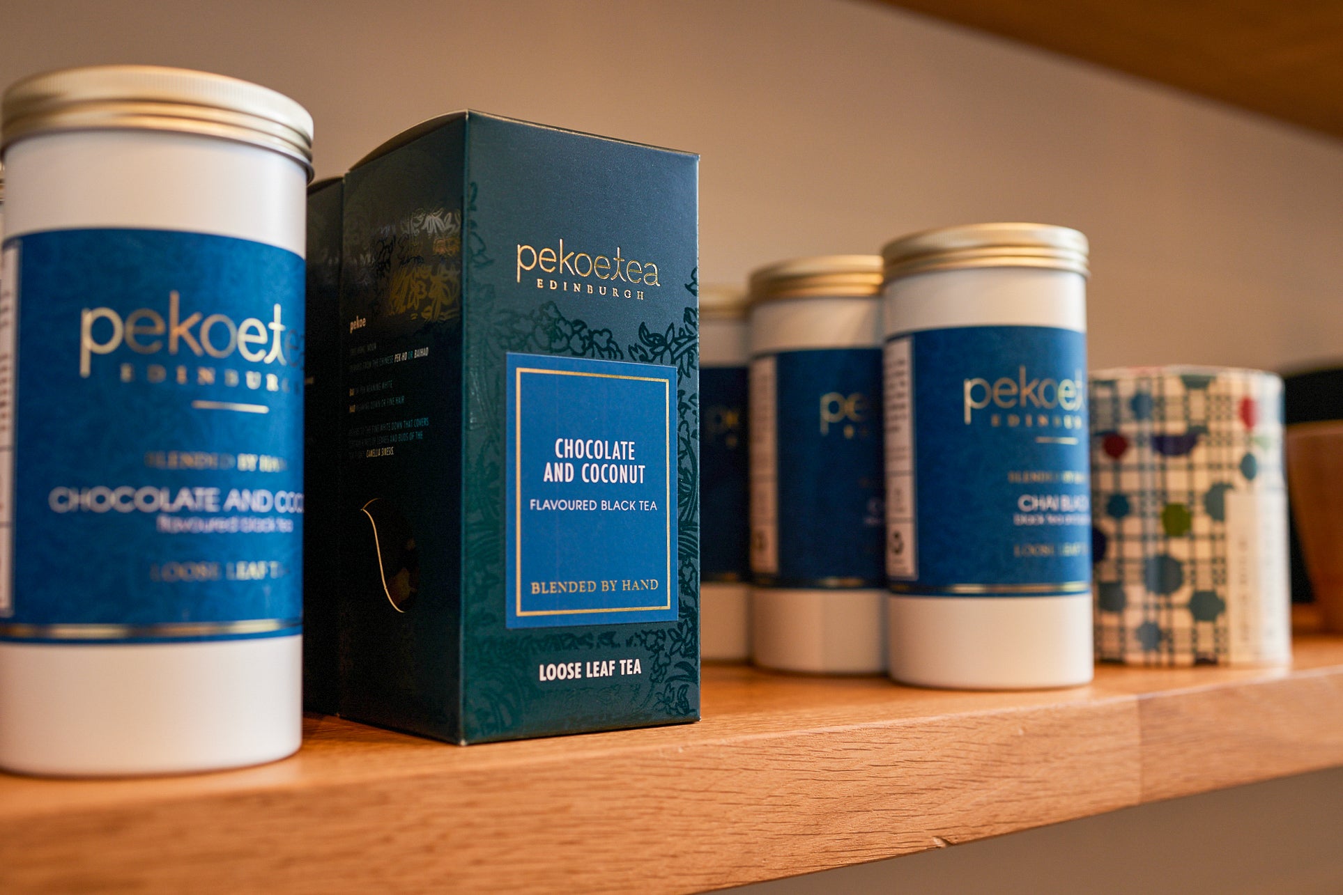 Tea caddies and boxes on our shelves in our shelf in our Edinburgh Tea Studio