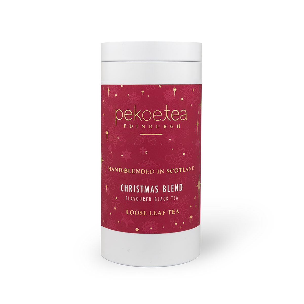 A cylindrical tin container of PekoeTea Edinburgh Christmas Blend black loose leaf tea, with festive red label design.