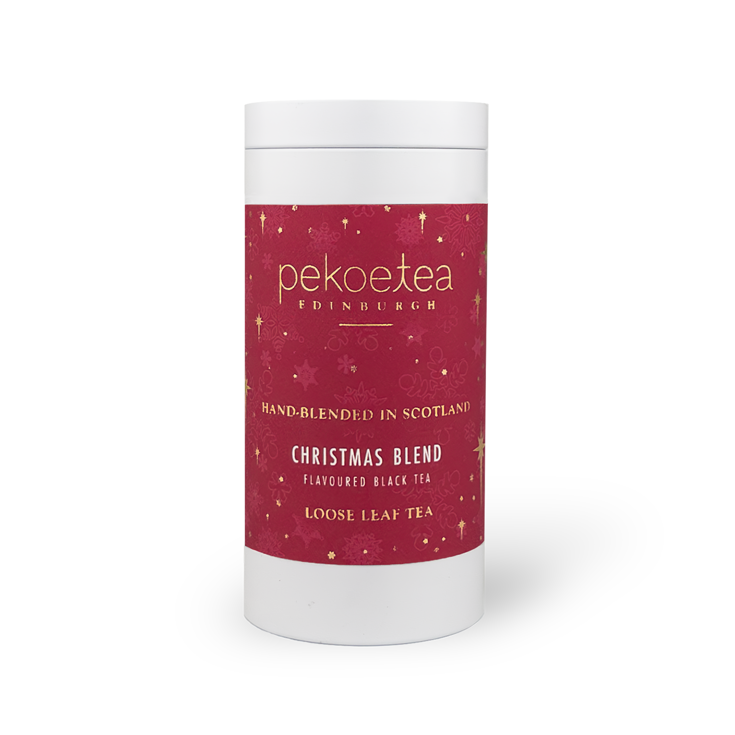 A cylindrical tin container of PekoeTea Edinburgh Christmas Blend black loose leaf tea, with festive red label design.