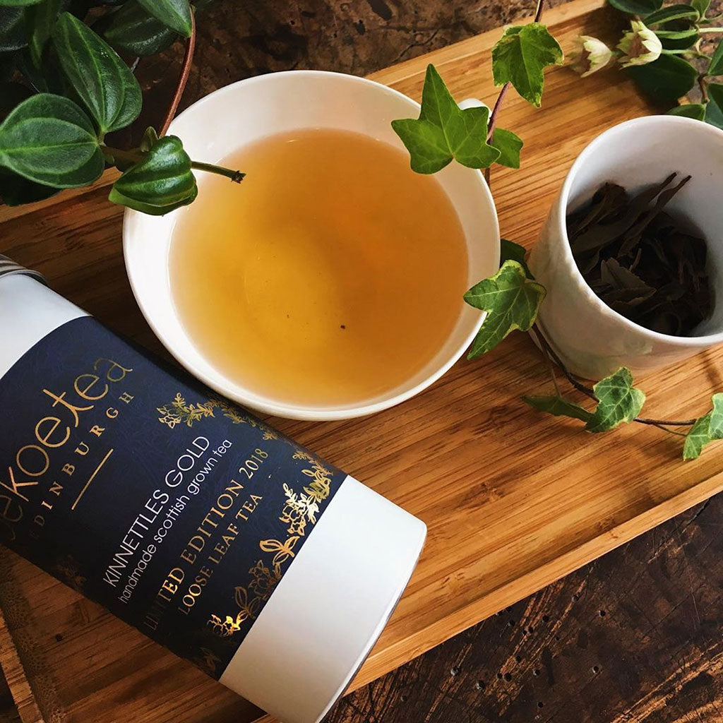 Kinnettles Gold Scottish Grown Tea in a Caddy and brewed in a cup